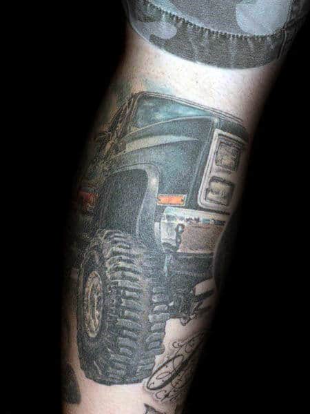 Lifted Truck With Big Tires Mens Leg Tattoos