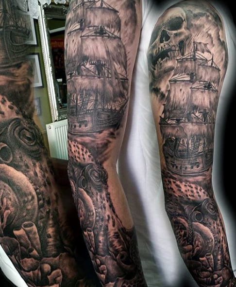 Lighthouse And Ship Guy's Tattoo