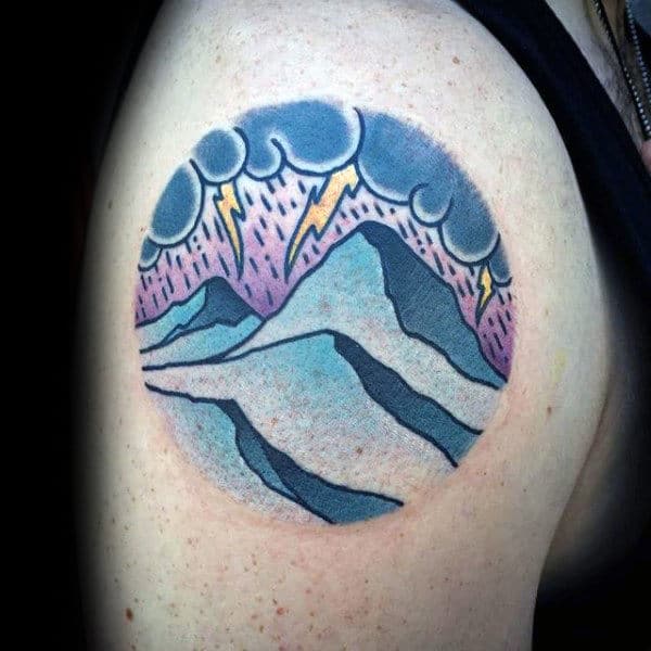 Lighting Thunder With Mountains Mens Circle Tattoo On Upper Arm