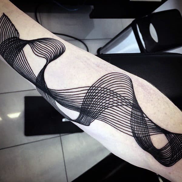 Abstract black line tattoo design on a forearm