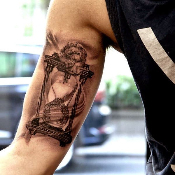 Lion And Hourglass Mens Bicep Tattoo Design Inspiration