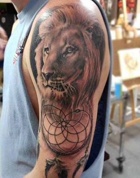 Lion Dreamcatcher Tattoo On Mans Arm