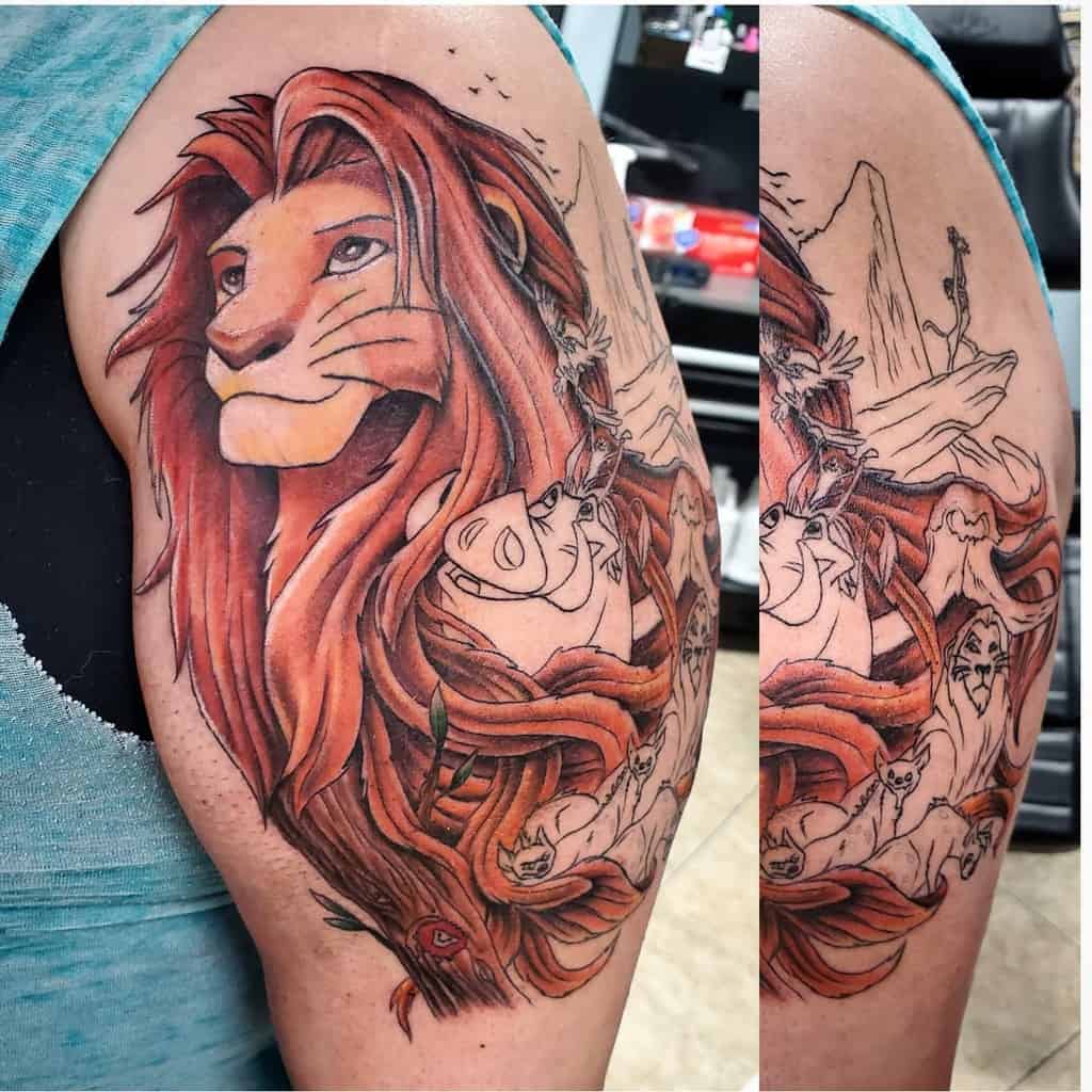 Detailed tattoo of Simba in his adult form, with scenes from his journey, including Timon, Pumbaa, and other characters, blending into a tree design