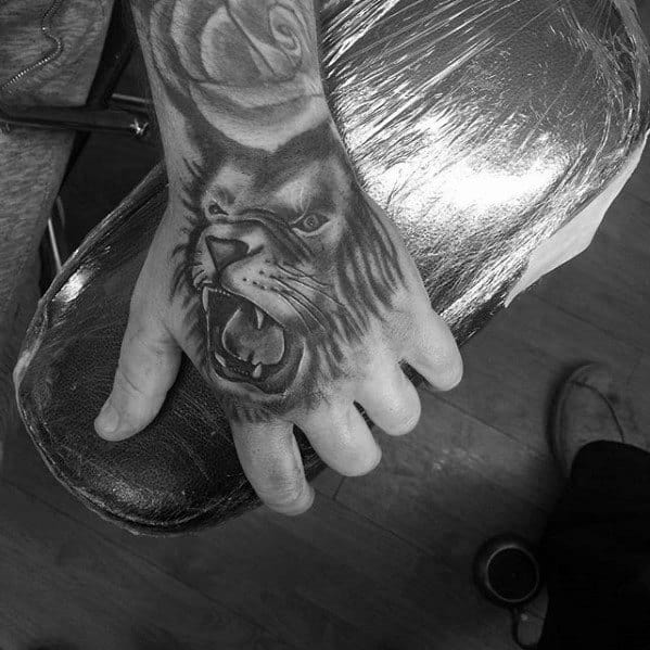Lion Roaring Hand Tattoos For Males