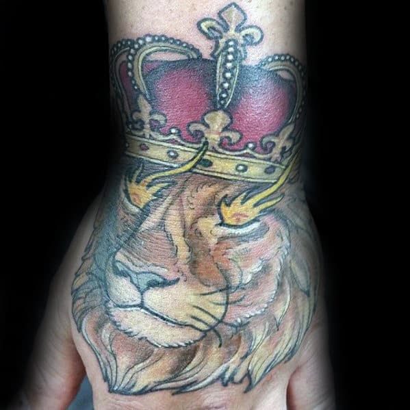 Lion With Crown Guys Tattoo On Hand