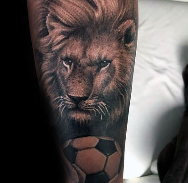 Lion With Soccerball Mens Forearm Sleeve Tattoo Design Inspiration