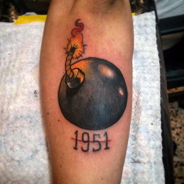 Lit Up Black Round Bomb 1951 Tattoo Male Forearm