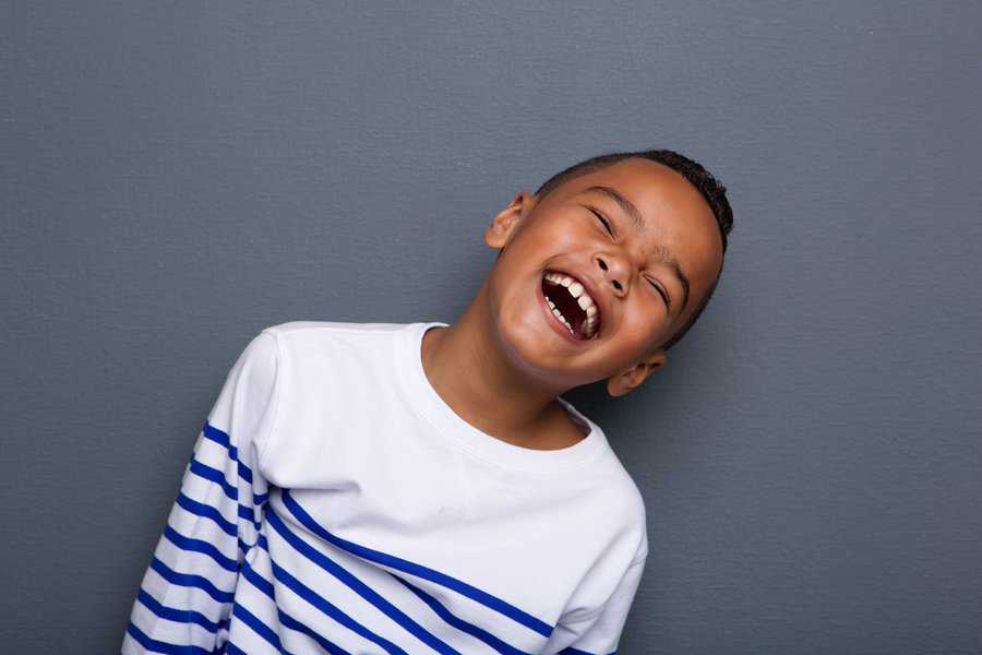 Close,Up,Portrait,Of,A,Happy,Little,Boy,Smiling,On