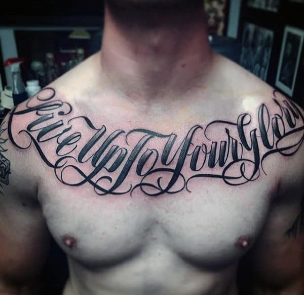 Live Upto Your Glory Lettering Tattoo Male Chest