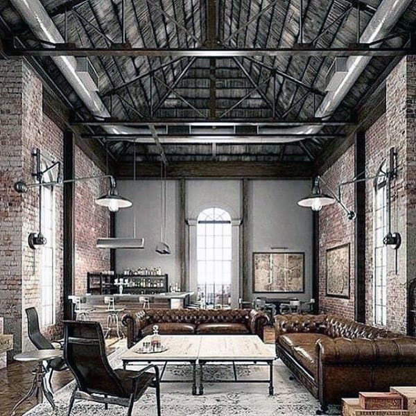 vintage luxury living room brown leather sofas exposed brick walls dual coffee tables 