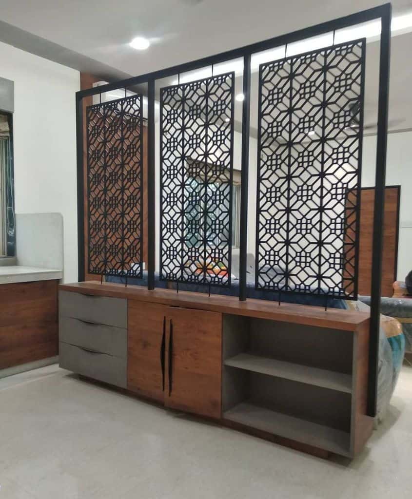ornate carved metal room divider and cabinet
