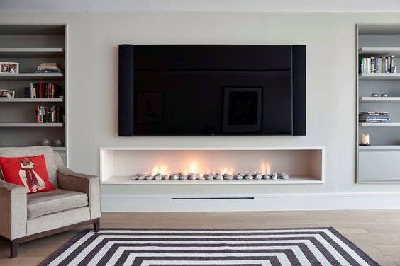 linear fireplace with TV above