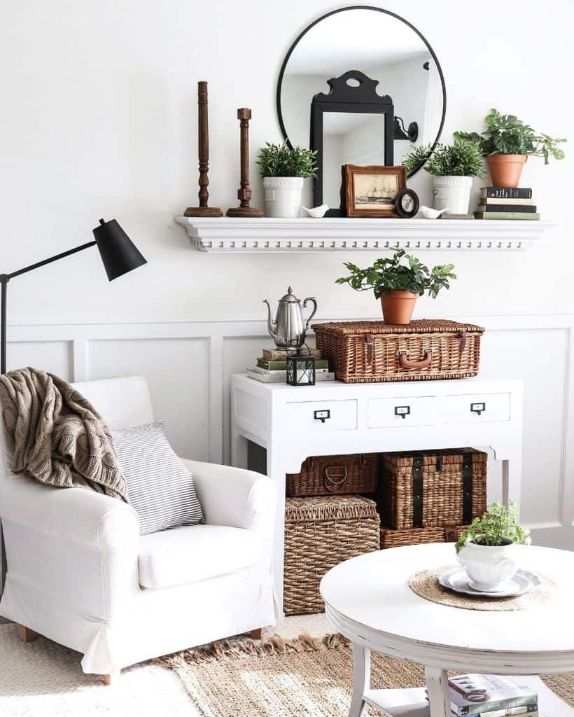 quaint white farmhouse living room with basket storage