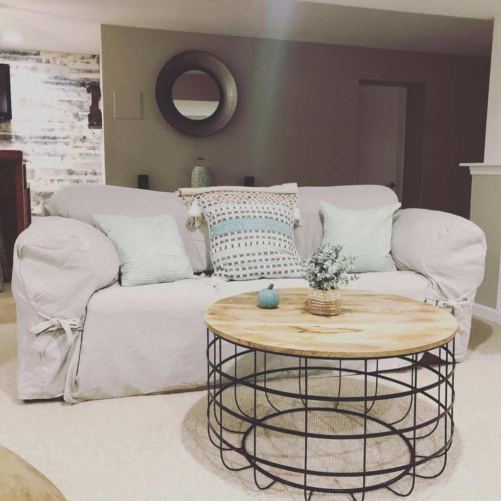 small basement living room with white sofa