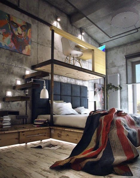 Industrial-style bedroom with loft workspace, concrete walls, and bold artistic accents.
