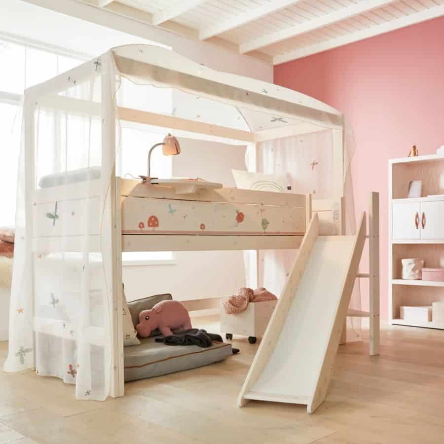 pink wall bedroom kids loft bed slide white cabinet