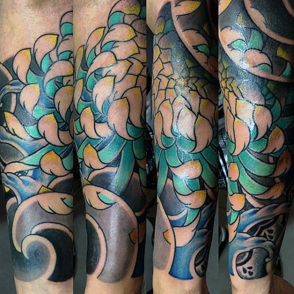 Colorful lotus sleeve tattoo with abstract floral and wave designs