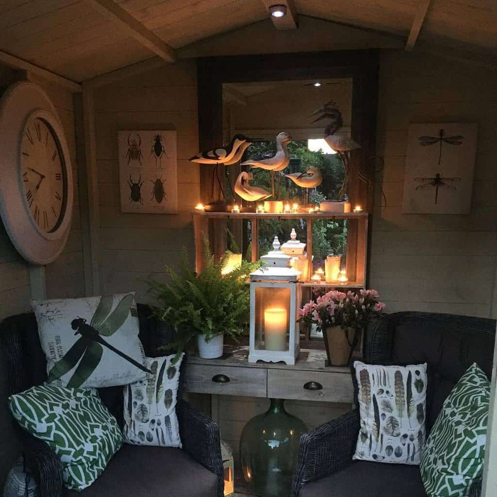 cozy she shed with wicker chairs and candles 