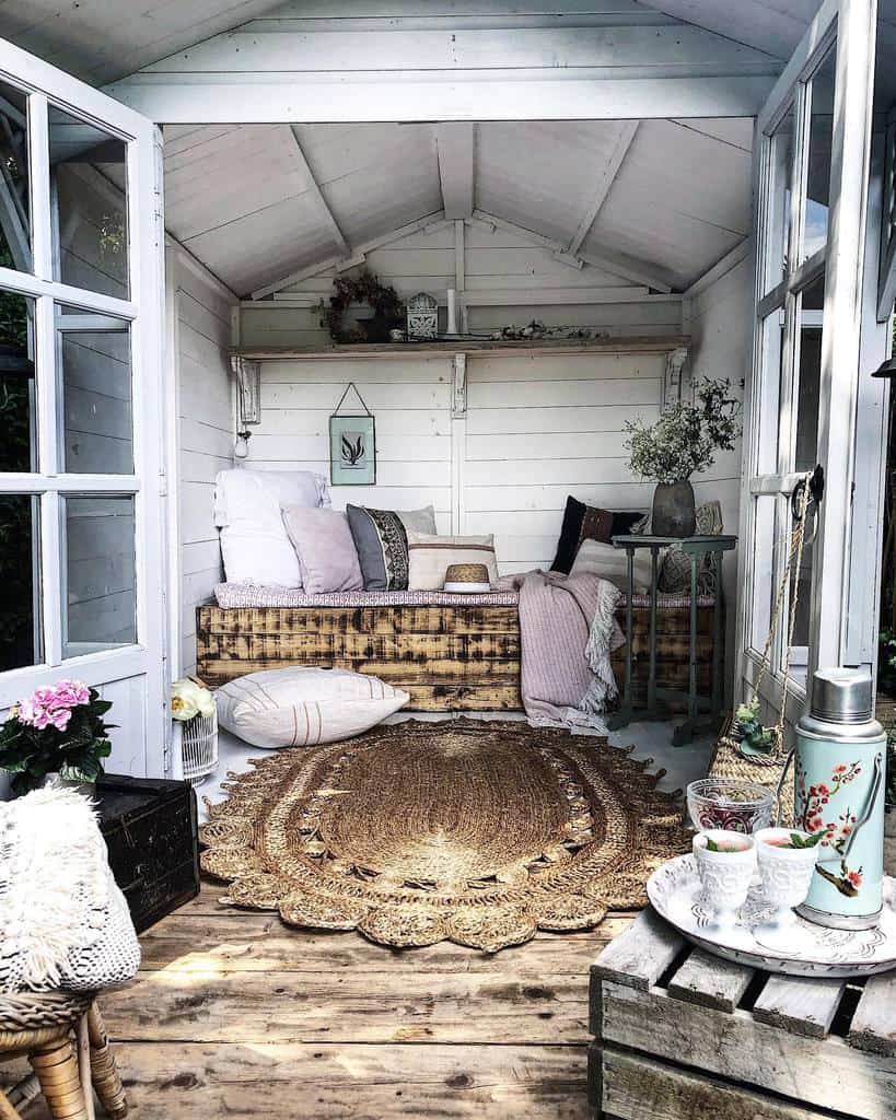 rustic she shed with bench seating 