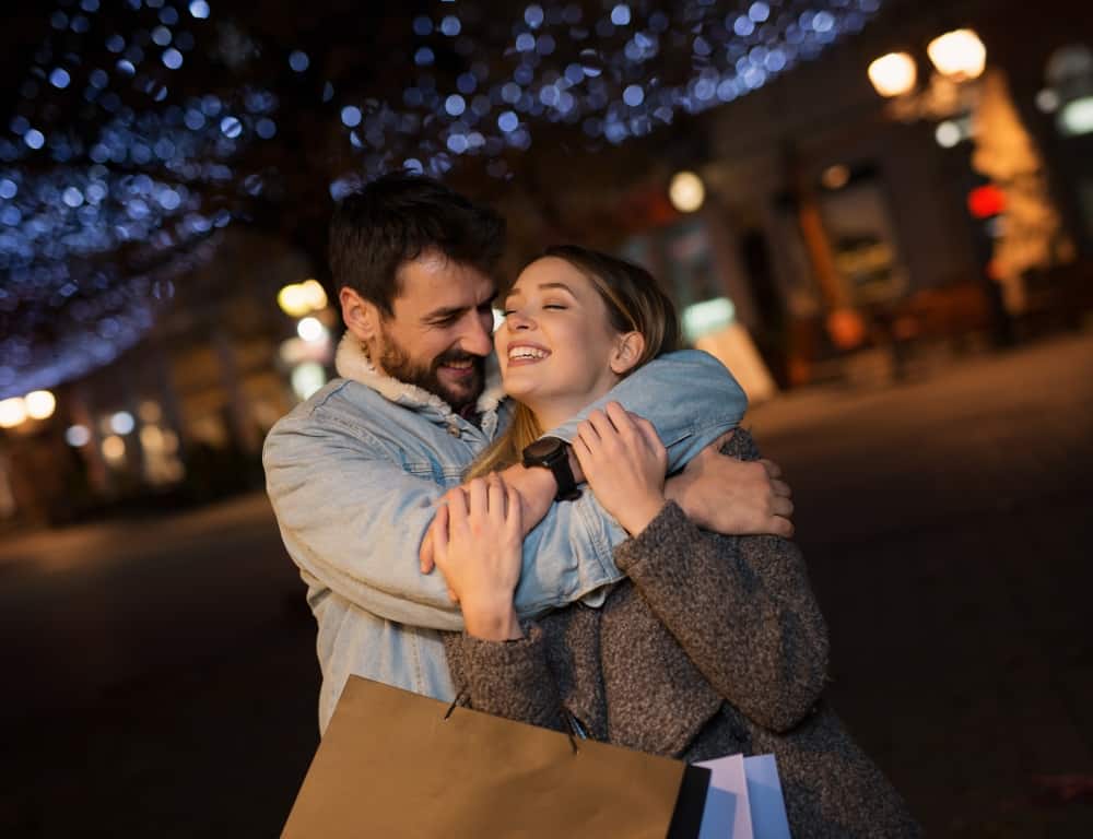 lovely couple date at night after shopping