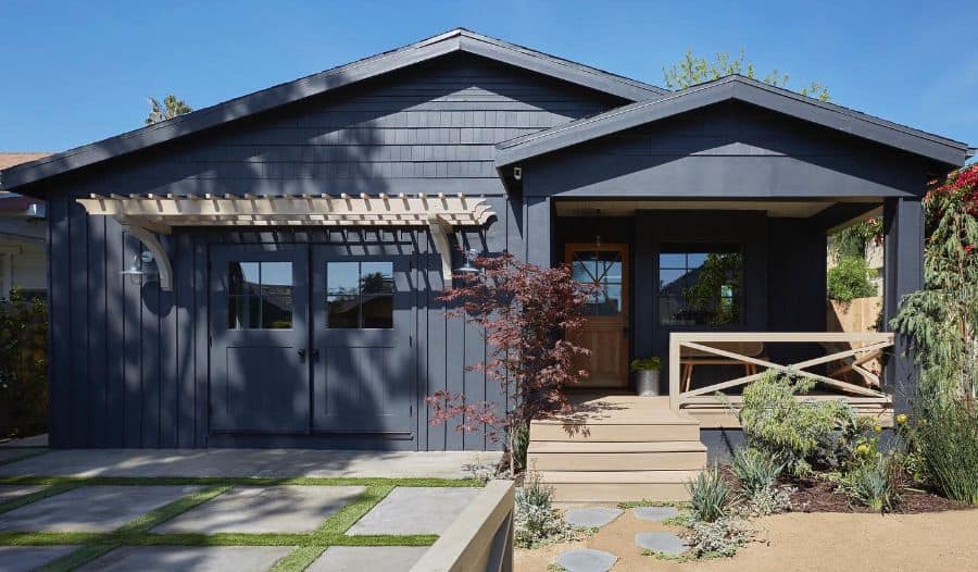 low pitch gable roof modern farmhouse gray exterior