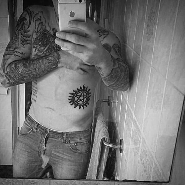 Lower Chest And Rib Cage Side Anti Possession Guys Tattoos