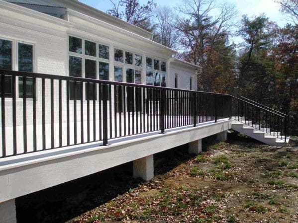 long white deck with black metal railing