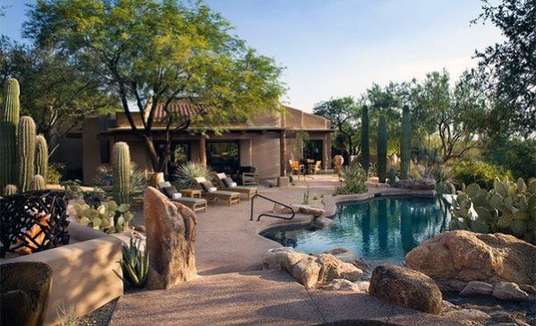 desert backyard pool cactus sun loungers