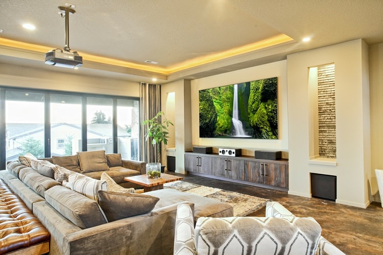 luxury home living room entertainment center projector wall mounted tv gray sofa 