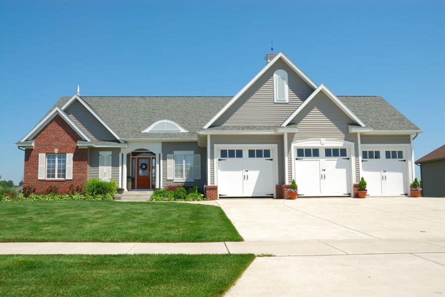 three door garage luxury ranch-style house