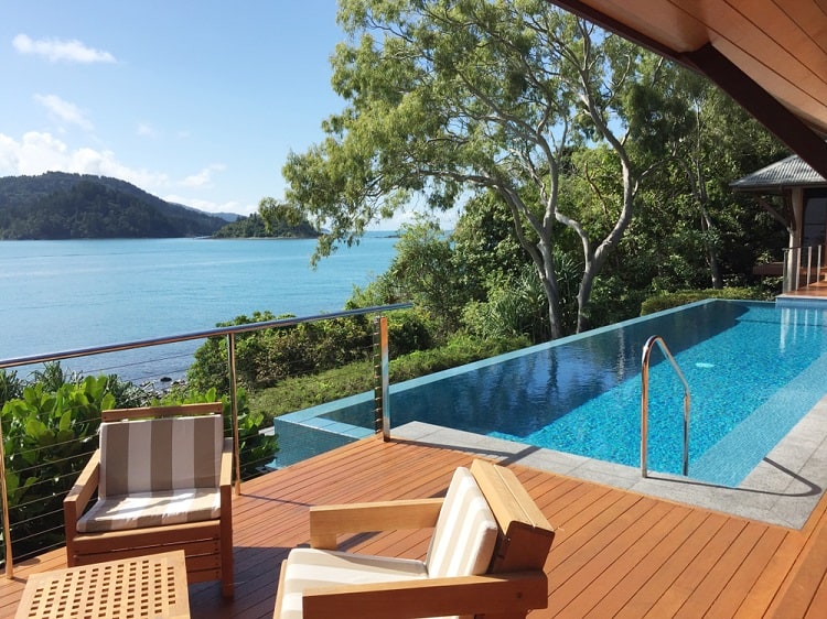 luxury resort above ground infinity pool deck