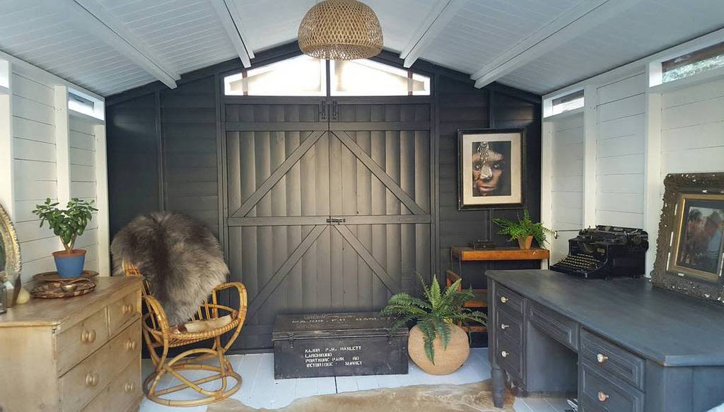 luxury she shed with barn door 