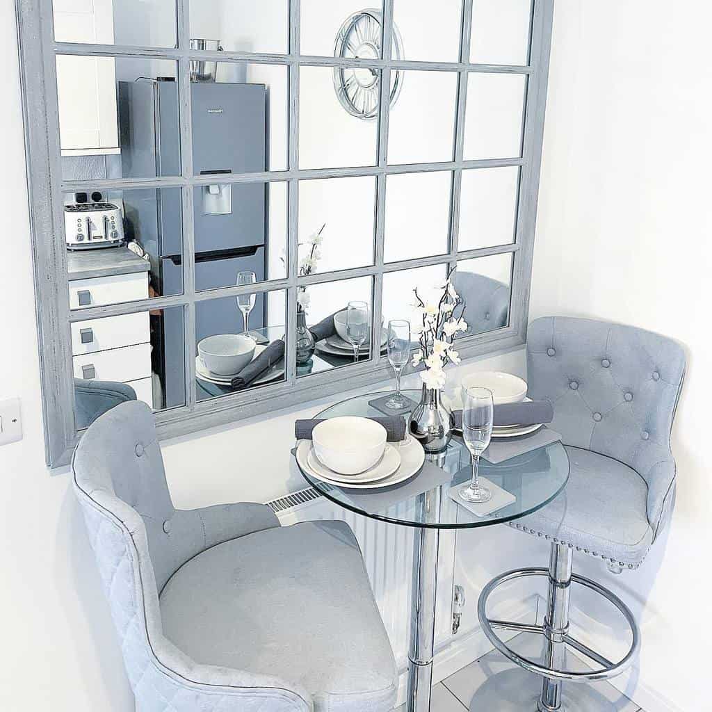 luxury gray small dining room with glass table