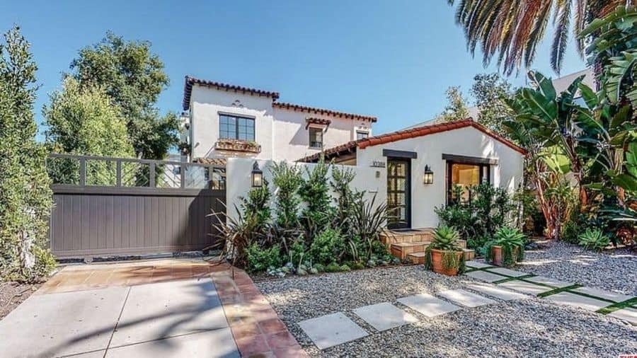 luxury spanish-style home front yard 