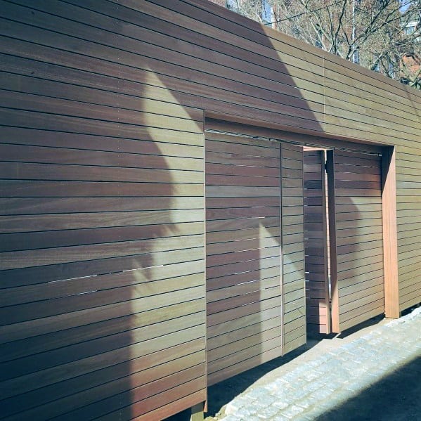 luxury wood privacy fence with hidden door