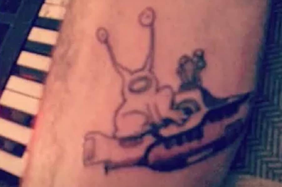 Alien Riding a Submarine Tattoo