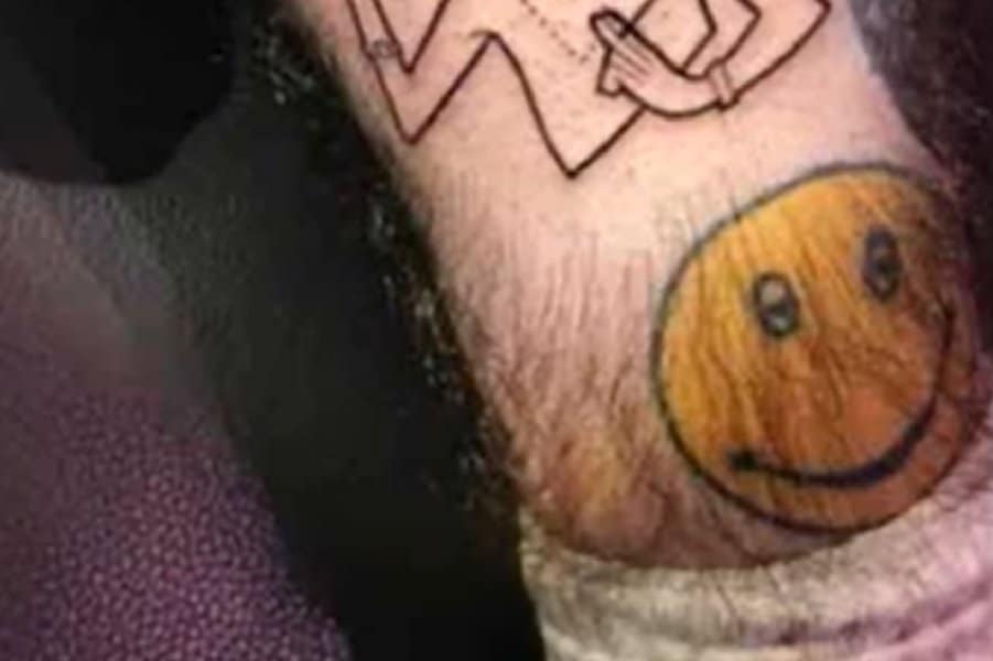 Yellow Smiley Face Tattoo