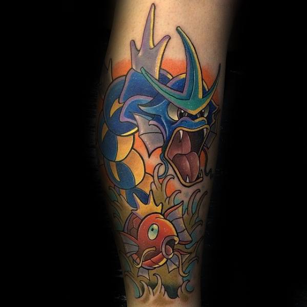 Vibrant tattoo of Magikarp and Gyarados with bold shading, crashing waves, and a fiery orange-to-purple gradient background.