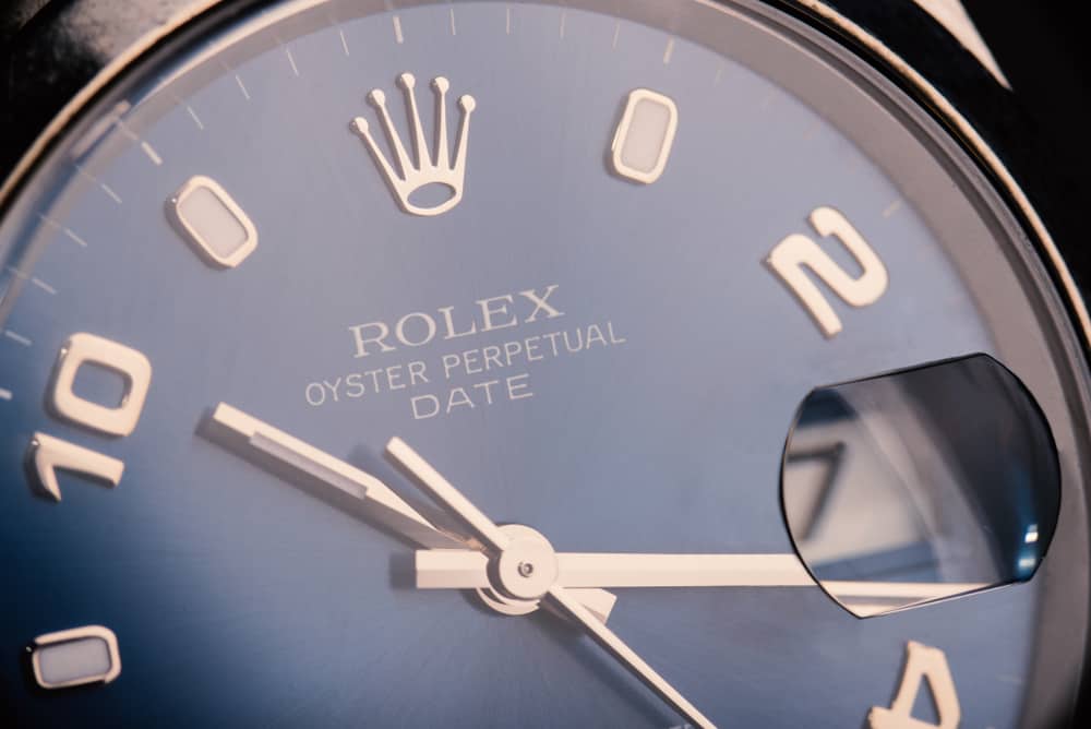 rolex oyster perpetual date watch magnification of date close up