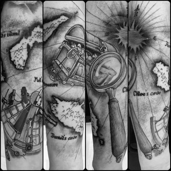 Tattoo featuring a magnifying glass, treasure map, compass, and nautical elements, designed with intricate shading for a bold and adventurous theme.