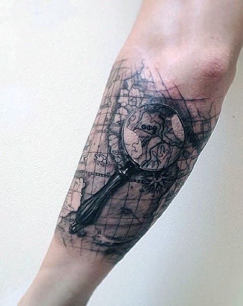 Magnifying Glass World Map Outer Forearm Mens Tattoo