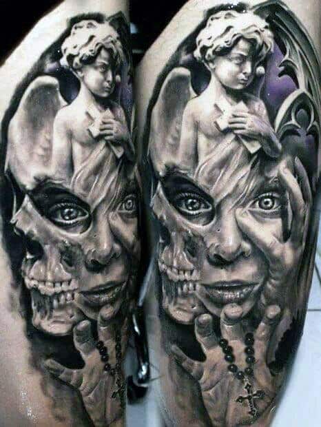 Surreal black and grey tattoo featuring a cherub statue above a face morphing into a skull, with a rosary entwined around the hand.