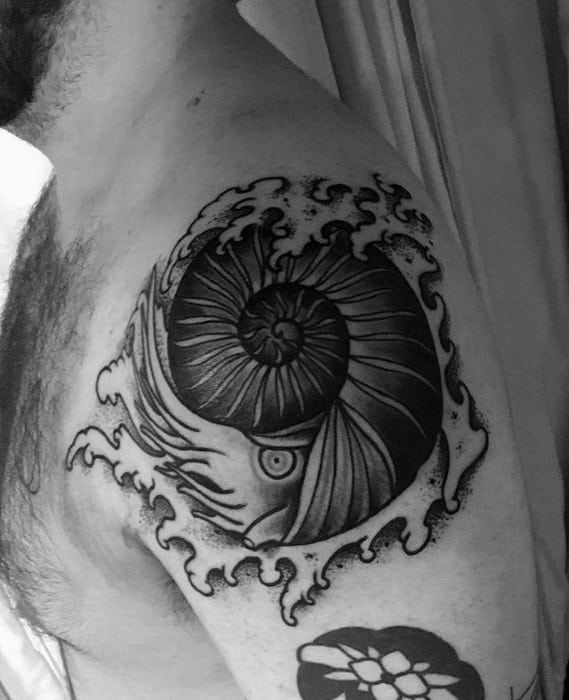 Male Ammonite Tattoo Ideas On Upper Arm
