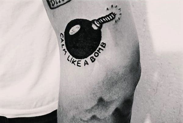 Male Arms Dark Black Calm Like A Bomb Tattoo