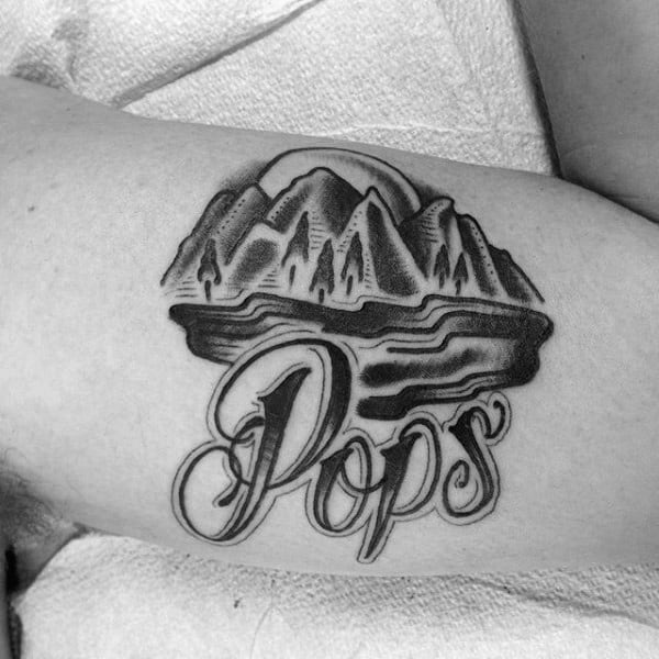 Male Arms Grey Hills And Dad Tattoo