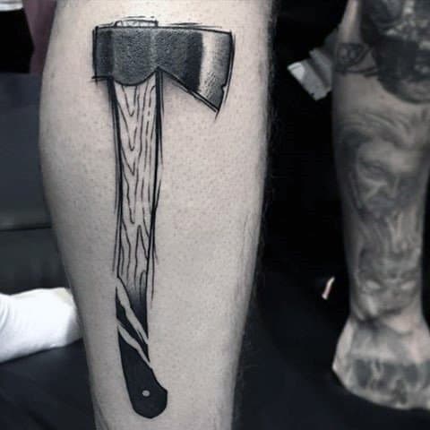 Male Axe Tattoo On Leg