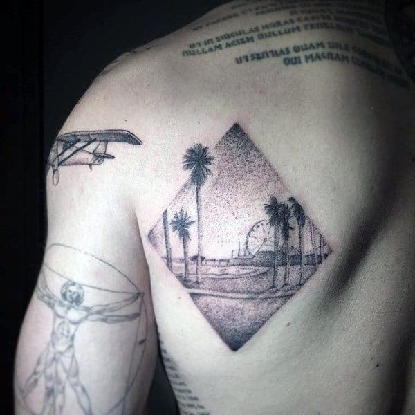 Male Back Palm Tress In Diamond Shaped Stamp Dotwork Tattoo