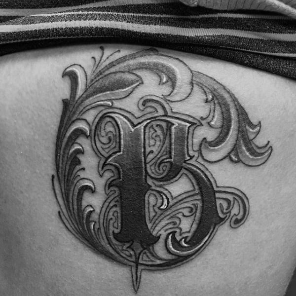 Male Back Single Lettering Tattoo