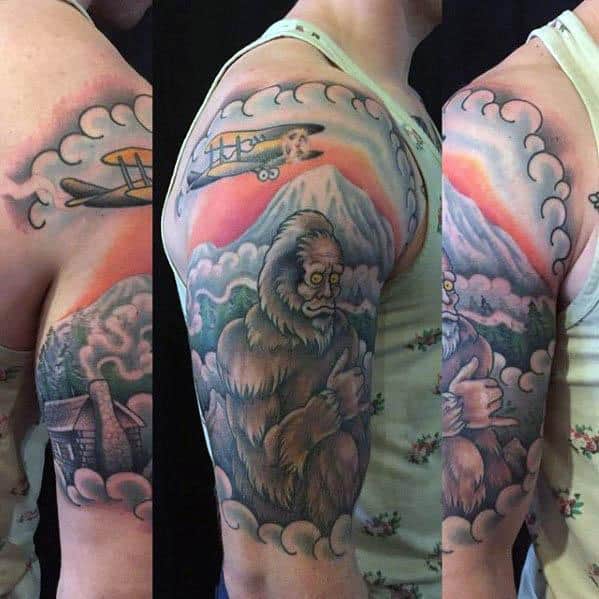 Male Bigfoot Half Sleeve Tattoo Design Inspiration