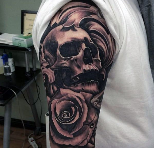 Male Black Ink Skull And Rose Flower Sleeve Tattoo